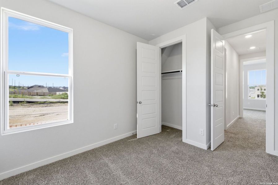 Spacious, unfurnished interior of a new home in The Meadows at Hunters Ranch, San Antonio (Image 29).