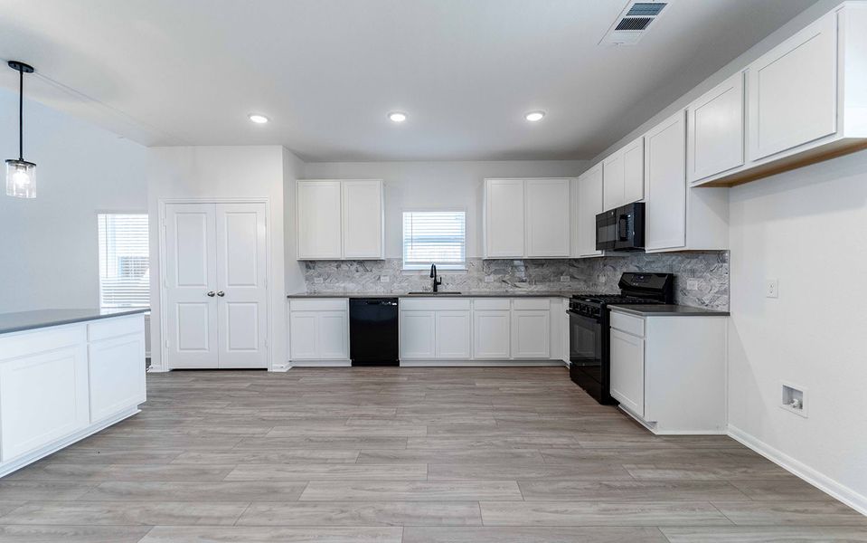 Furnished interior view inside a new home in Travis Ranch, Forney (Image 3). Furnished interior view inside a new home in Travis Ranch, Forney (Image 3).