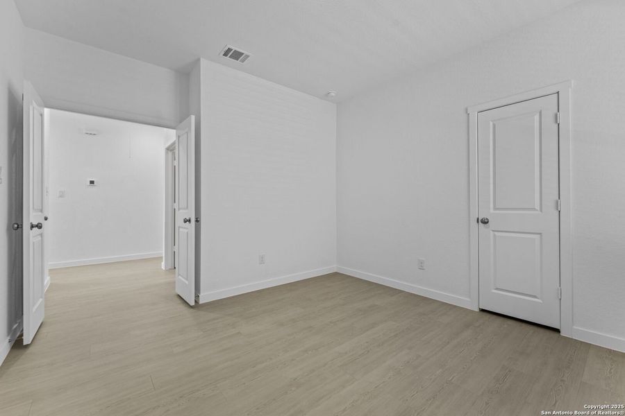 Spacious, unfurnished interior of a new home in Parkside: Coastline Collection, New Braunfels (Image 12).