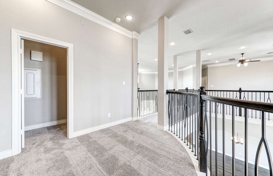 Representative unfurnished interior of a home built from the 4590 by Ravenna Homes in Artavia 70′, Conroe (Image 29).
