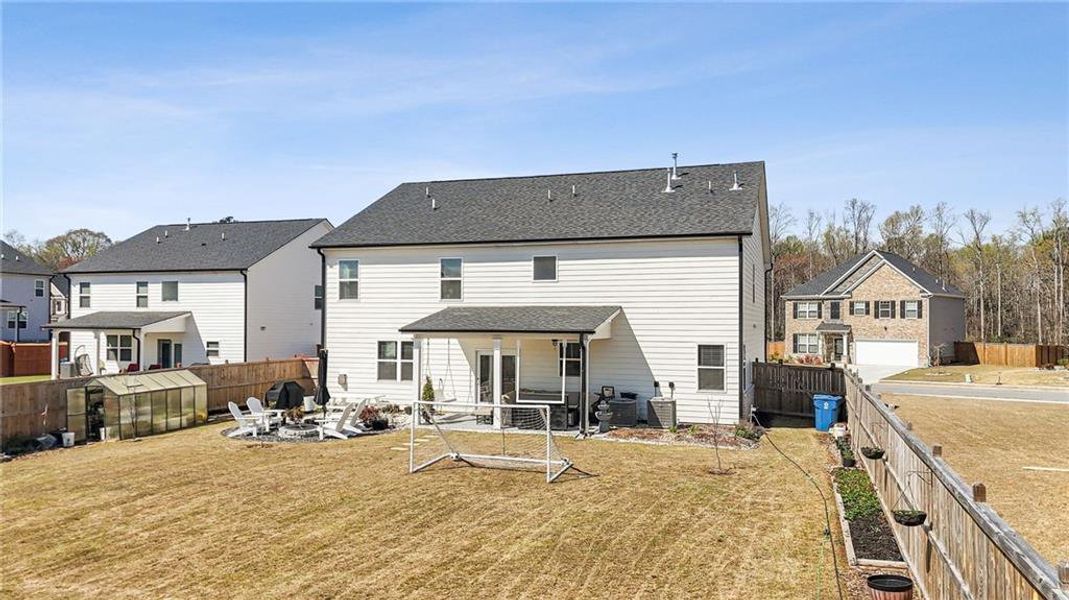 Exterior details and patio area of a home in Independence, Loganville (Image 35).