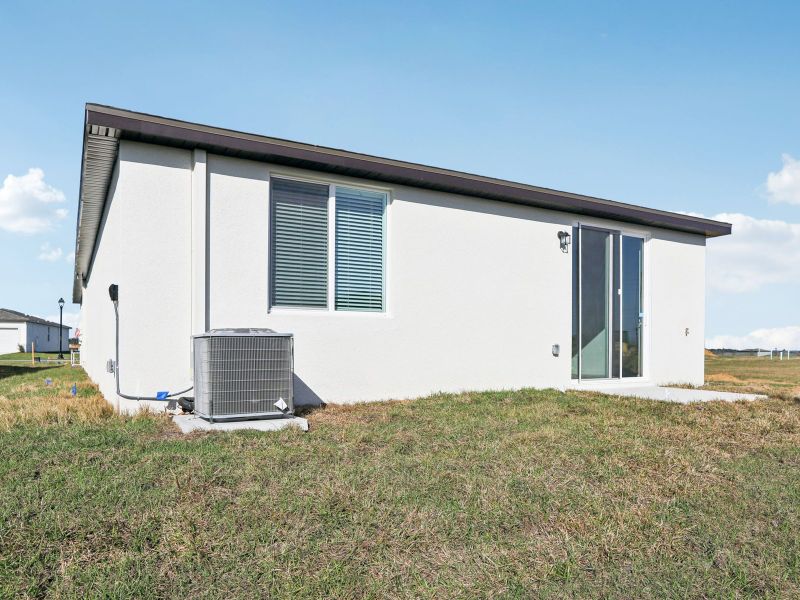 Exterior details and patio area of a home in Benton Hills - Premier Series, Brooksville (Image 16). Exterior details and patio area of a home in Benton Hills - Premier Series, Brooksville (Image 16).