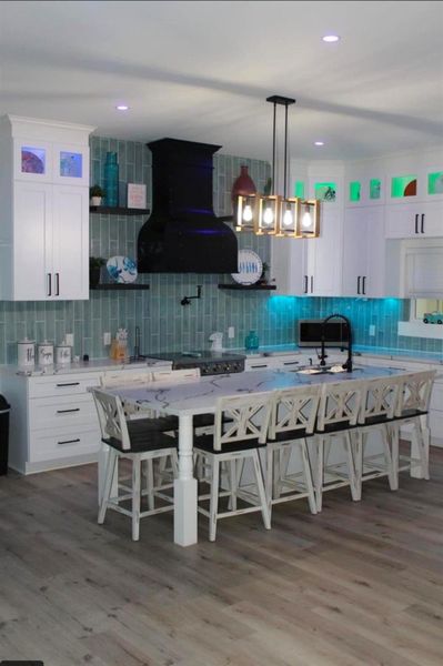 Enjoy breakfast or quick snacks at the large kitchen island with seating