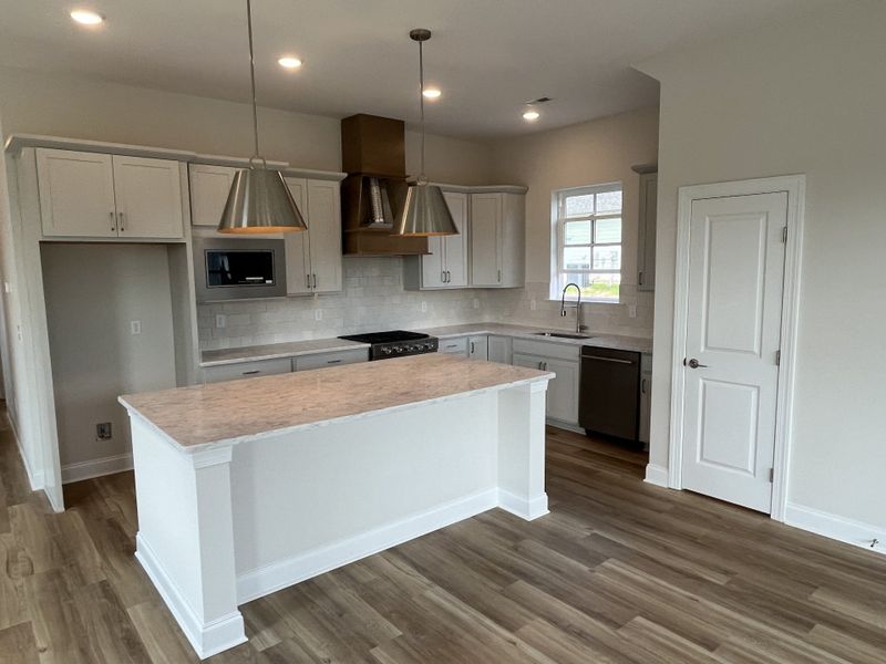 Furnished interior view inside a new home in Heritage Walk, Chattanooga (Image 6).