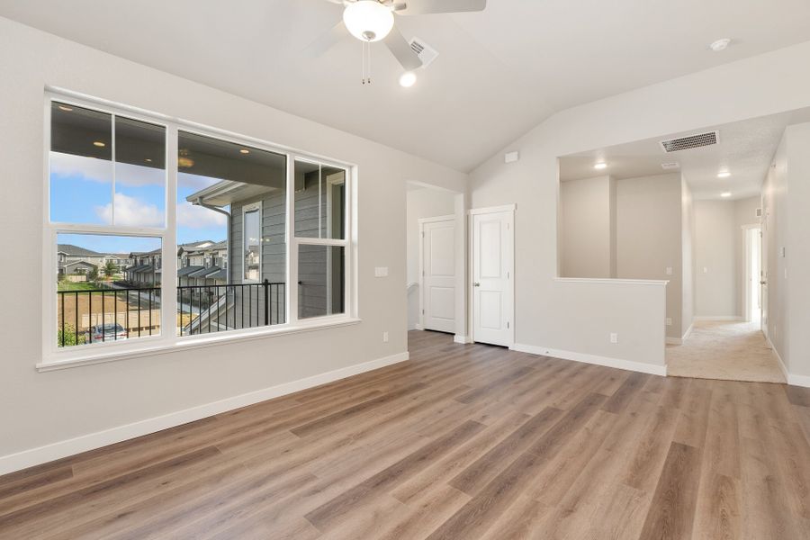 Spacious, unfurnished interior of a new home in The Lakes at Centerra, Loveland (Image 11).