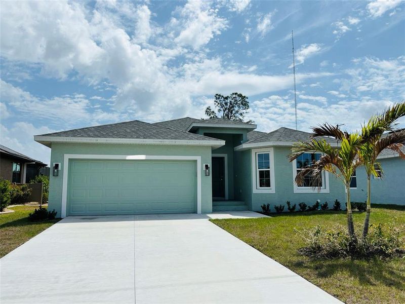 Front exterior of a new home in , Rotonda West, FL, highlighting curb appeal (Image 1). Front exterior of a new home in , Rotonda West, FL, highlighting curb appeal (Image 1).