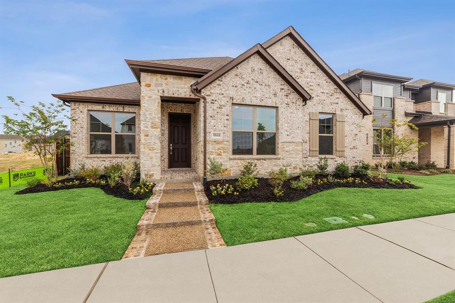 Front exterior of a new home in Talia – Garden Series, Mesquite, TX, highlighting curb appeal (Image 1).