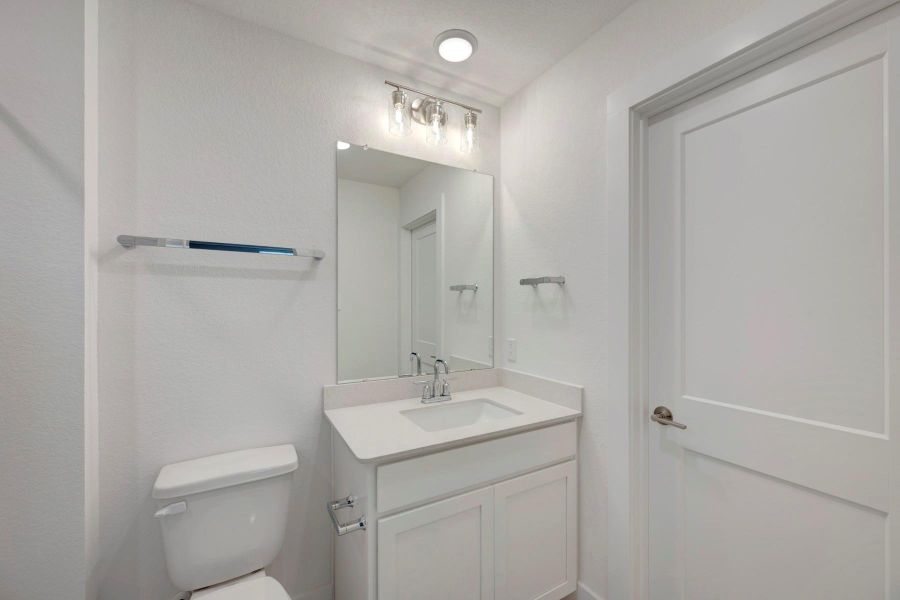 Furnished interior view inside a new home in Sorella, Tomball (Image 10).