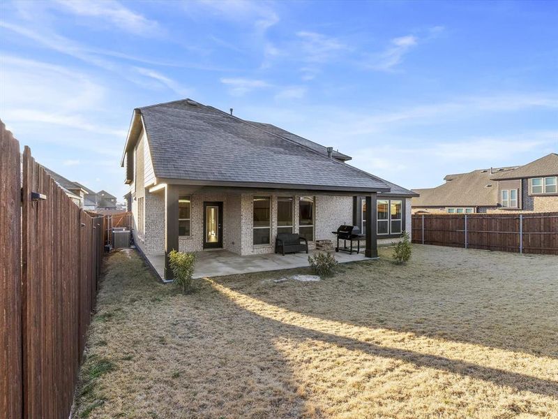 Exterior details and patio area of a home in Star Ranch, Godley (Image 3).