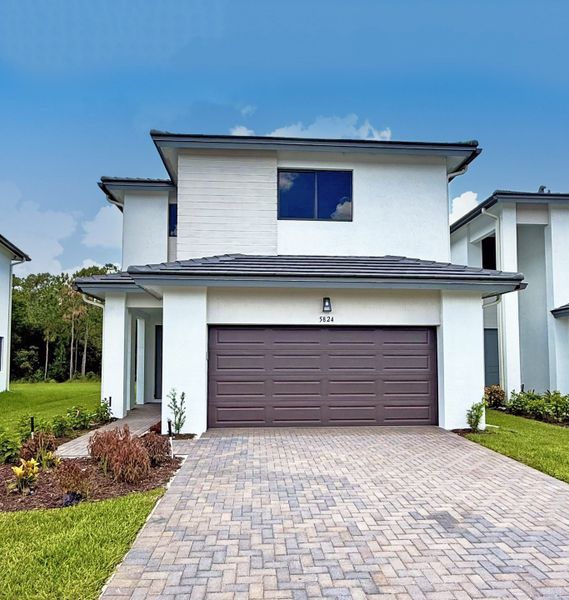 Front exterior of a home in the Maple Ridge community, located in Ave Maria, FL (Image 12). Front exterior of a home in the Maple Ridge community, located in Ave Maria, FL (Image 12).