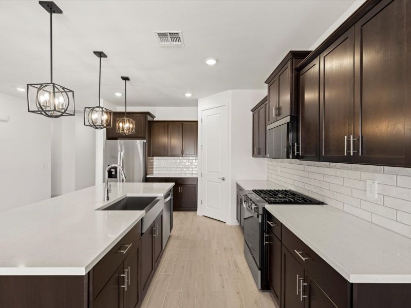 Furnished interior view inside a new home in Mountain View Estates Signature Series, Buckeye (Image 4).