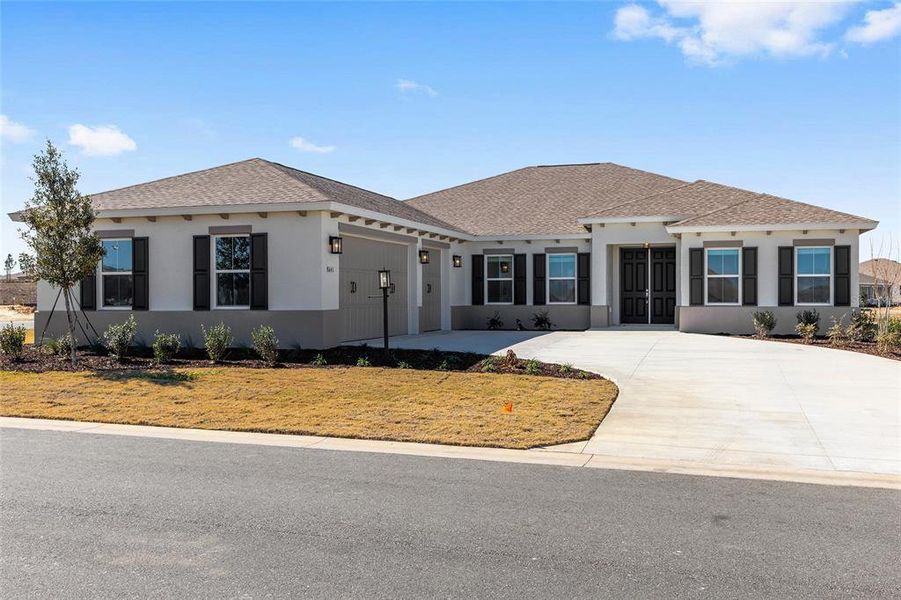 Front exterior of a new home in , Ocala, FL, highlighting curb appeal (Image 19).