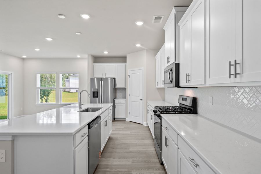 Furnished interior view inside a new home in Cypress Ridge - The Coastline Series, Longs (Image 8).