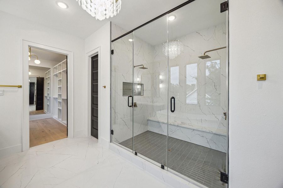 Luxurious shower is 7' with dual shower heads and separate entries Luxurious shower is 7' with dual shower heads and separate entries