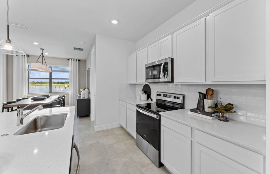Furnished interior view inside a new home in The Strand at Cedar Grove, North Port (Image 6).