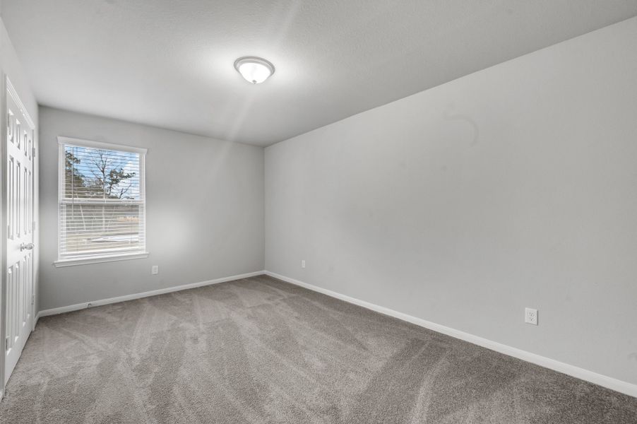 Representative unfurnished interior of a home built from the Floor Plan 1774 by Colina Homes in Rollingbrook Estates, Baytown (Image 22).