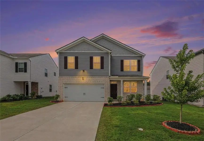 Front exterior of a new home in , Fairburn, GA, highlighting curb appeal (Image 28). Front exterior of a new home in , Fairburn, GA, highlighting curb appeal (Image 28).
