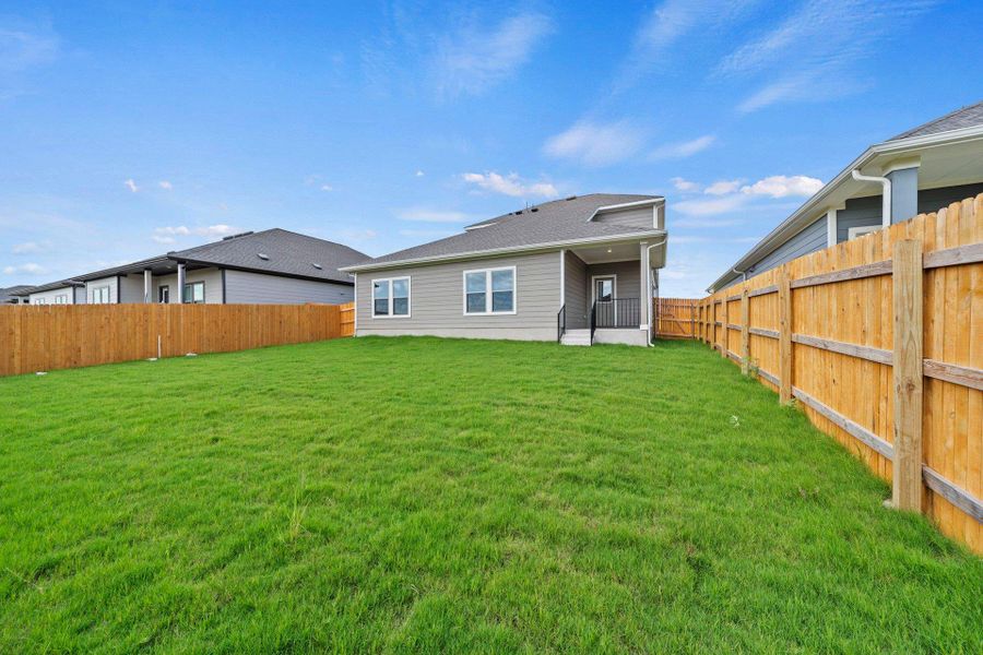 Rear of Home and Private Backyard
