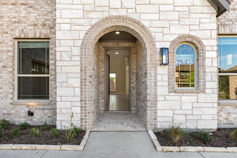 Exterior details and patio area of a home in The Enclave at Parks of Aledo, Aledo (Image 26). Exterior details and patio area of a home in The Enclave at Parks of Aledo, Aledo (Image 26).