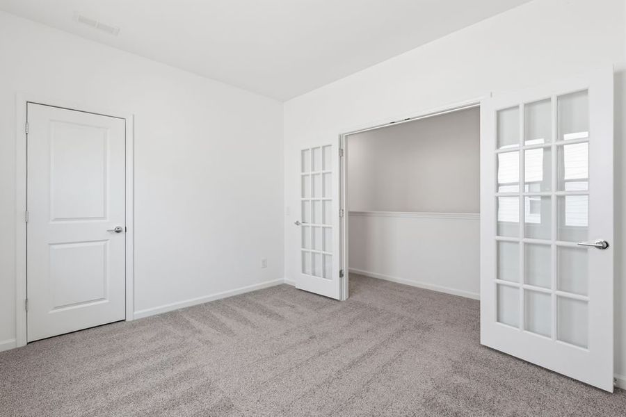 Spacious, unfurnished interior of a new home in Ridge at Sugar Creek, Indian Land (Image 10).