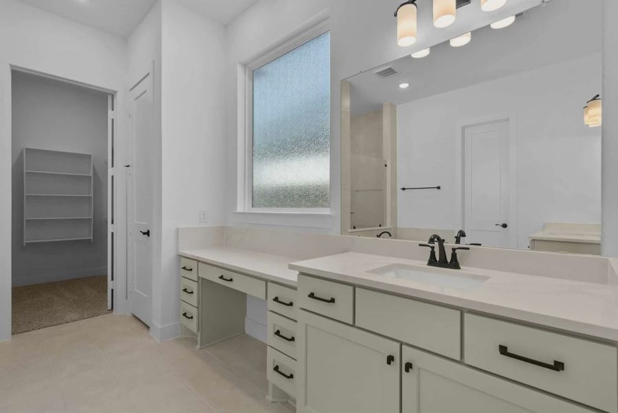 Representative furnished interior of a home built from the Nicklaus by Chesmar Homes in Riceland Alley Loads, Mont Belvieu (Image 8).