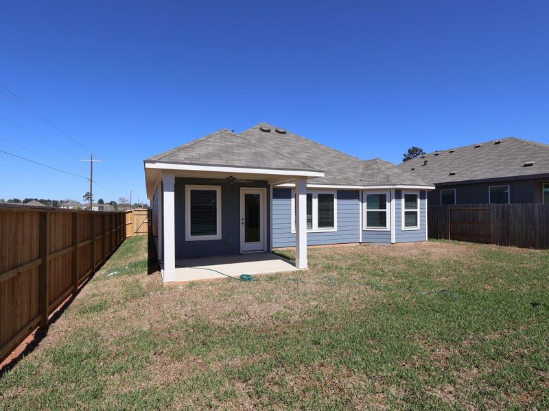 Exterior details and patio area of a home in Moran Ranch, Willis (Image 4).