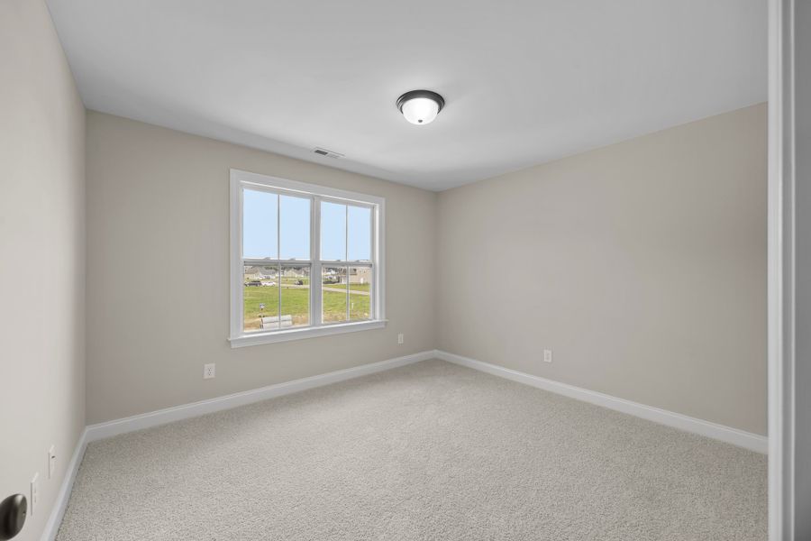 Spacious, unfurnished interior of a new home in Laurel Oaks, Greenville (Image 48).
