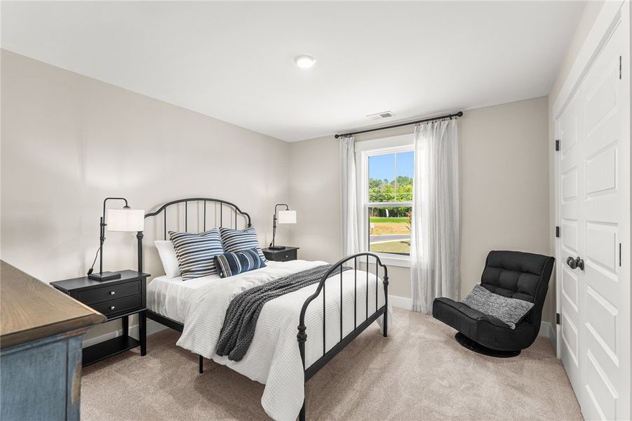 This inviting bedroom offers comfort and a tranqui