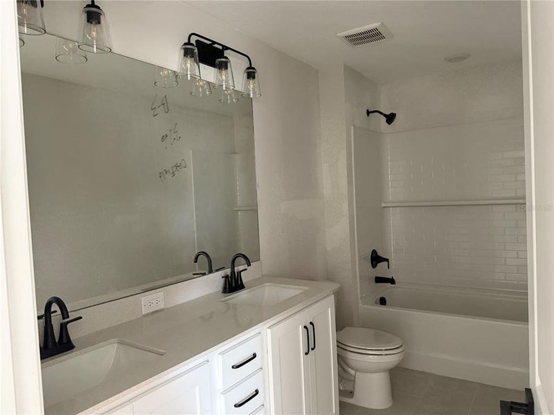 In-progress construction of a new home in Oakfield Trails Signature, Parrish, FL (Image 28). In-progress construction of a new home in Oakfield Trails Signature, Parrish, FL (Image 28).