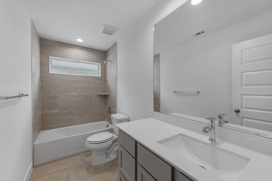 Furnished interior view inside a new home in Grand Mason Crossing, Katy (Image 5).