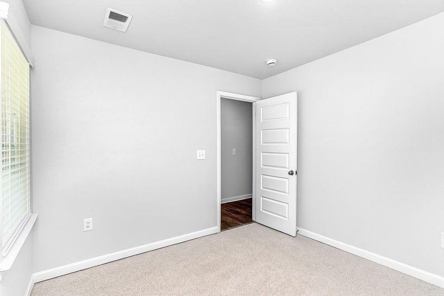 Spacious, unfurnished interior of a new home in , Macon (Image 18).