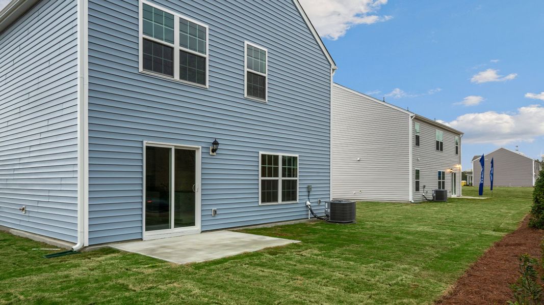 Exterior details and patio area of a home in Hobbs Farm, Ayden (Image 3).