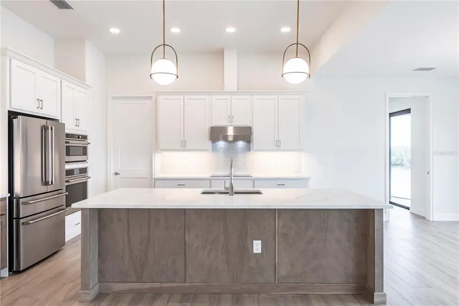 Furnished interior view inside a new home in , Port Charlotte (Image 7).