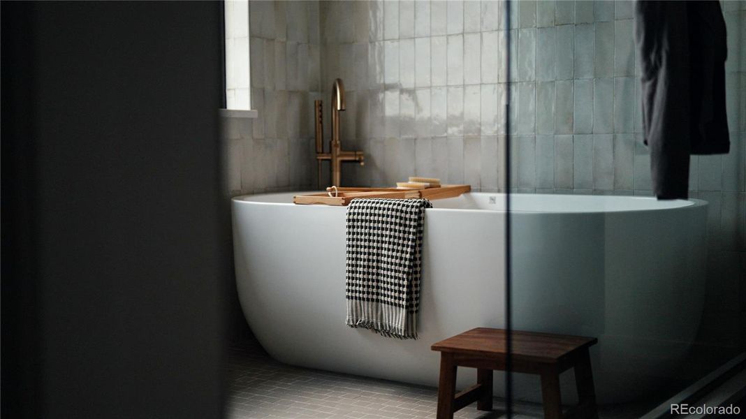 Furnished interior view inside a new home in Signature at Crystal Valley, Castle Rock (Image 15).