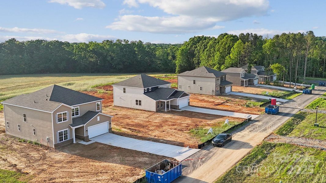 Front exterior of a new home in Running Creek, Locust, NC, highlighting curb appeal (Image 2).