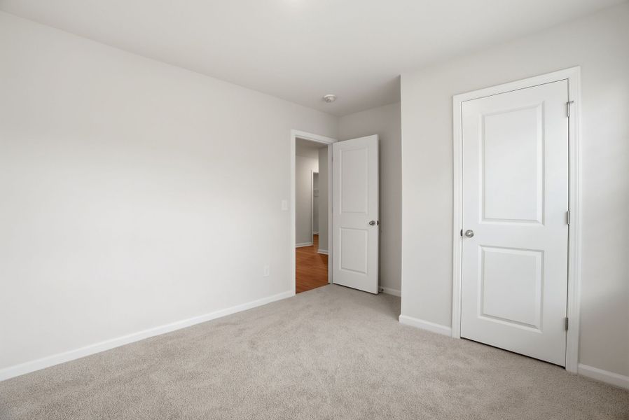 Representative unfurnished interior of a home built from the Spruce L by McGuinn Homes in Sibley Village, Sumter (Image 24).