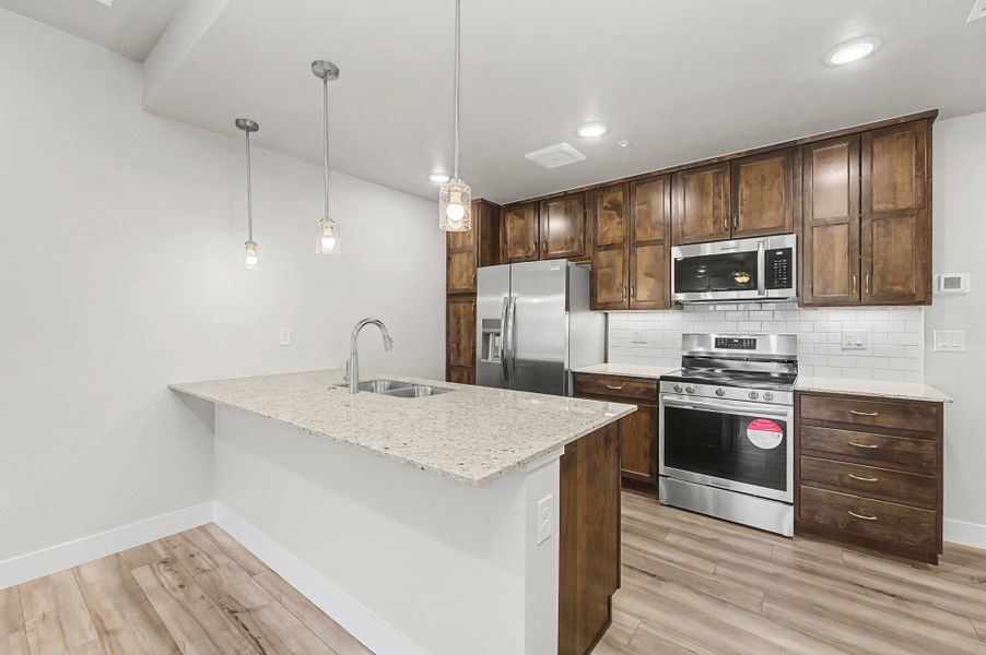 Furnished interior view inside a new home in Highlands at Fox Hill, Longmont (Image 3).