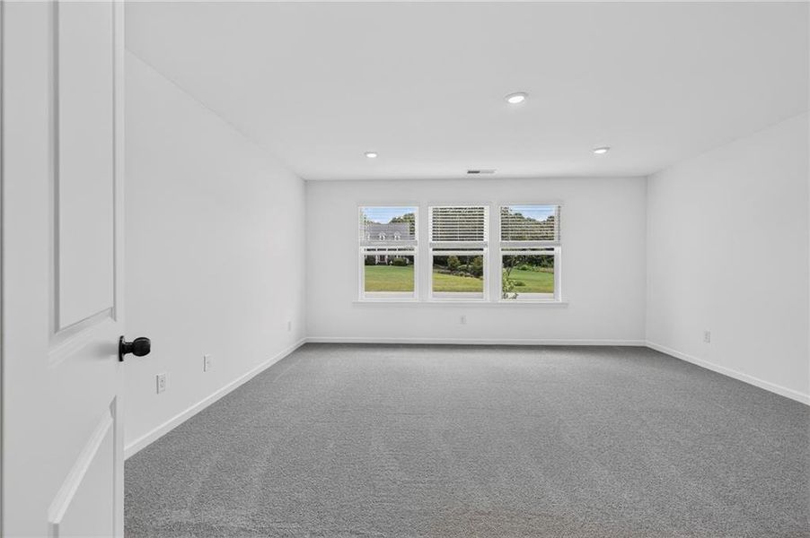 Spacious, unfurnished interior of a new home in Towns at Holly Springs, Holly Springs (Image 12). Spacious, unfurnished interior of a new home in Towns at Holly Springs, Holly Springs (Image 12).