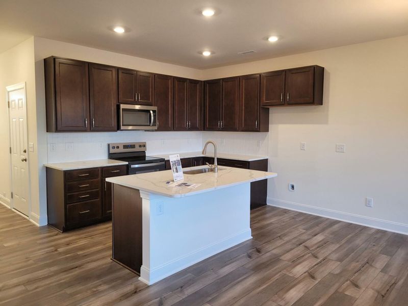 Furnished interior view inside a new home in 1158 Place Townhomes, Wilson (Image 5).