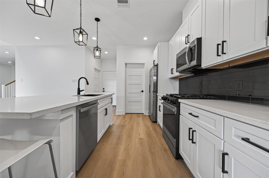 Furnished interior view inside a new home in , Conroe (Image 15).
