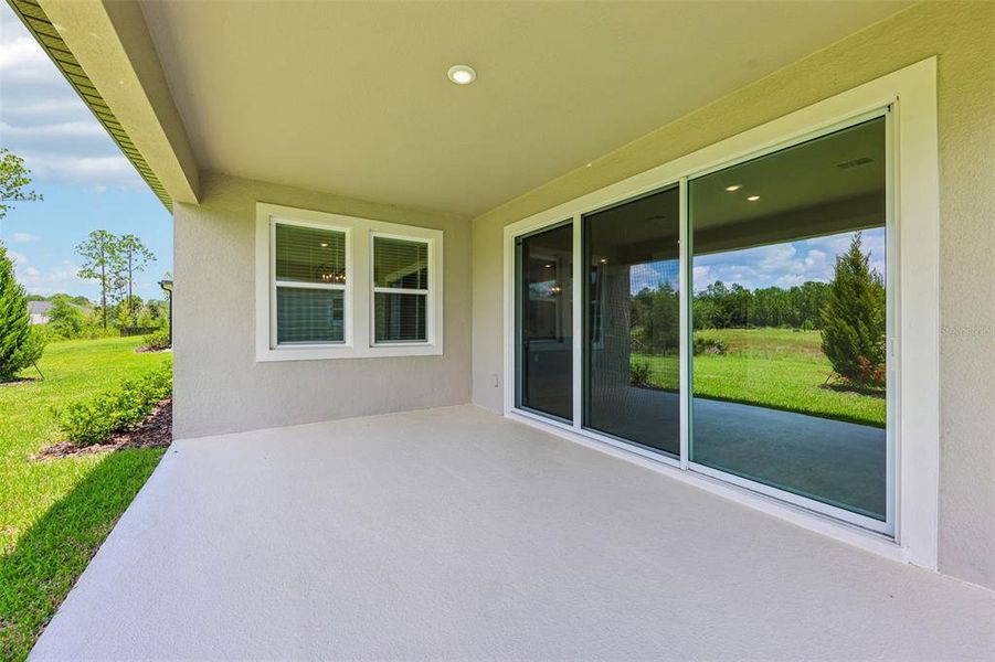 Exterior details and patio area of a home in Ridgehaven - Reserve Series, Ormond Beach (Image 3). Exterior details and patio area of a home in Ridgehaven - Reserve Series, Ormond Beach (Image 3).