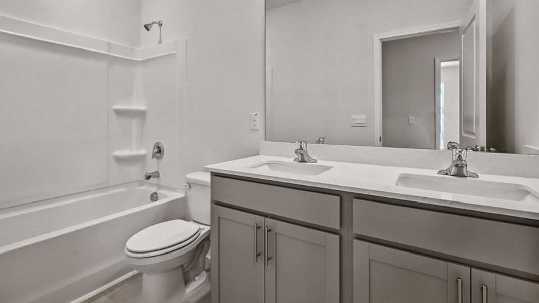 Representative furnished interior of a home built from the DANIEL by D.R. Horton in The Townes Park, Apex (Image 9). Representative furnished interior of a home built from the DANIEL by D.R. Horton in The Townes Park, Apex (Image 9).