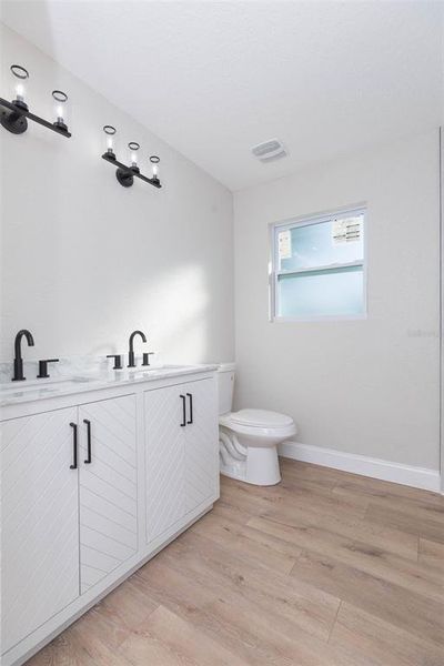 Furnished interior view inside a new home in , Dade City (Image 9).