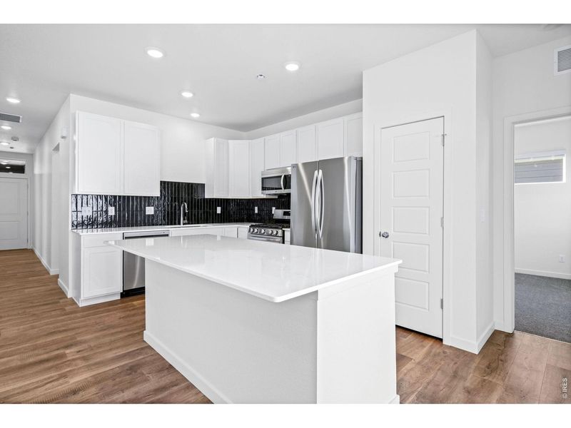 Furnished interior view inside a new home in Union Colony West, Greeley (Image 5).