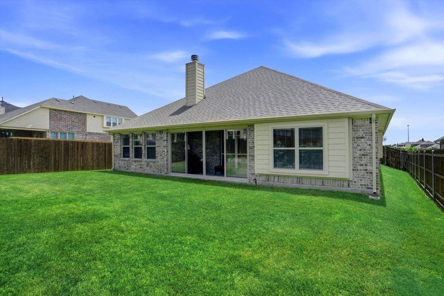 Exterior details and patio area of a home in Star Ranch, Godley (Image 4).
