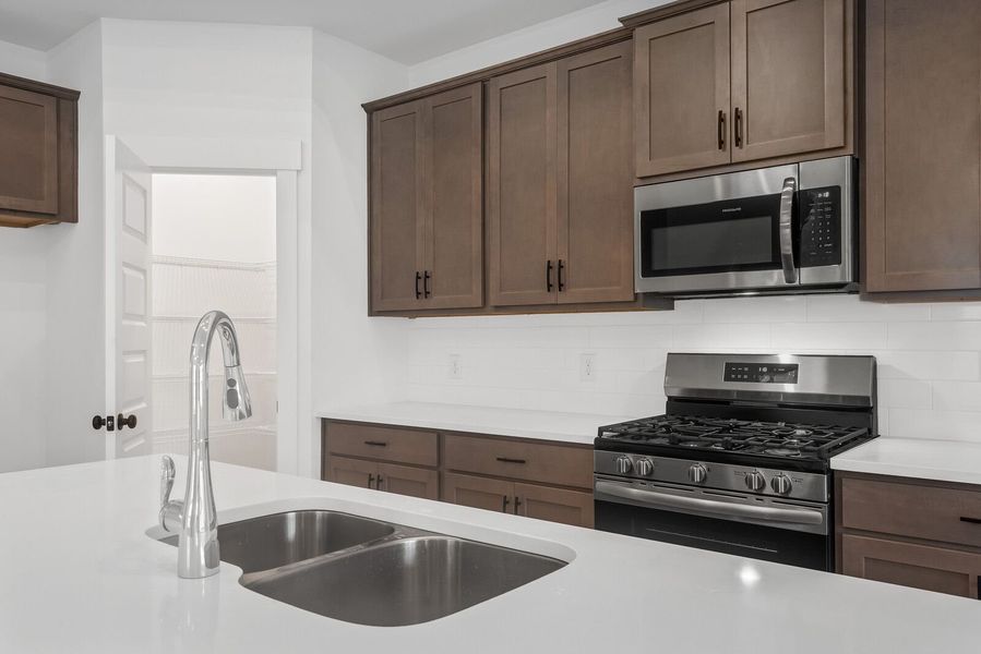 Furnished interior in a model home at Parks at Foster Crossing in Anna (Image 9). Furnished interior in a model home at Parks at Foster Crossing in Anna (Image 9).