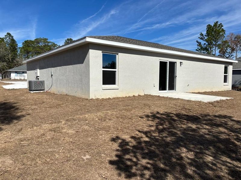 Exterior details and patio area of a home in , Citrus Springs (Image 17).