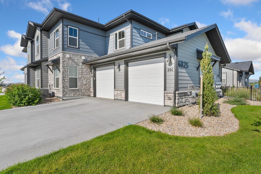 Representative exterior photo of a completed home built from the The Monarch by Landmark Homes in Highlands at Fox Hill, Longmont, CO (Image 2). Representative exterior photo of a completed home built from the The Monarch by Landmark Homes in Highlands at Fox Hill, Longmont, CO (Image 2).