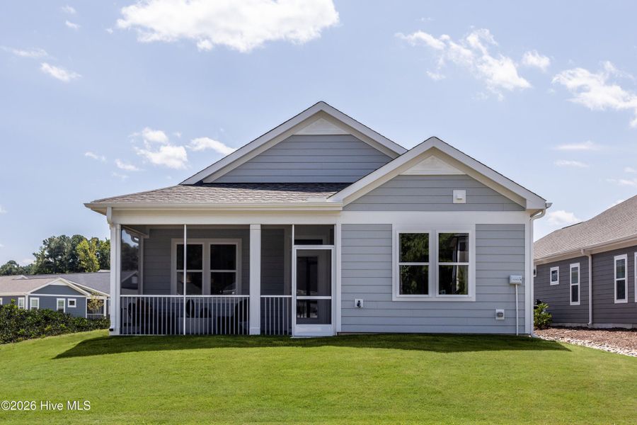 Exterior details and patio area of a home in Coastal Haven, Leland (Image 4).