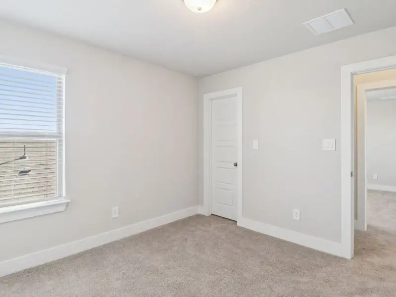 Spacious, unfurnished interior of a new home in Legendary Trails - Premier Series, Cibolo (Image 23).